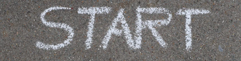 start written on asphalt